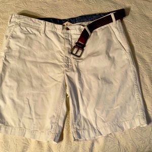 White polo shorts with belt